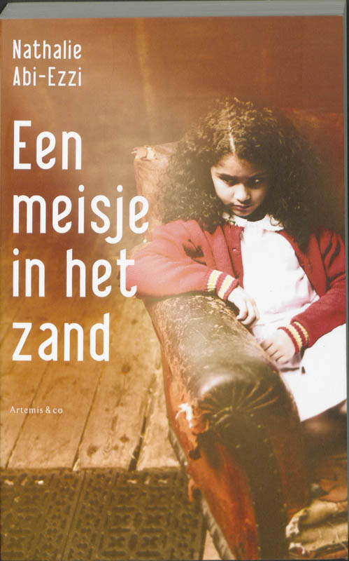 Omslag van Een meisje in het zand