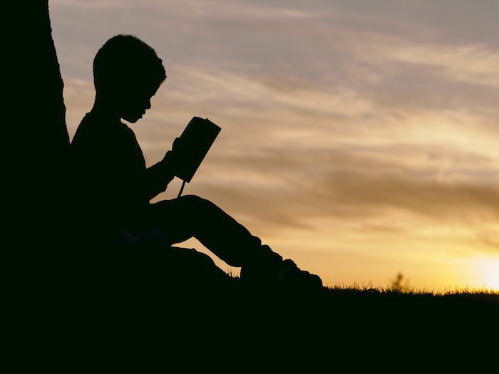 Child reading a book