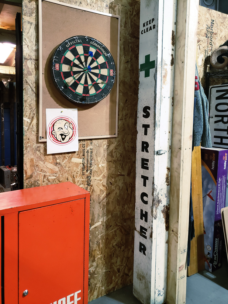 A stretcher box has been repurpoused into a liquor cabinet.