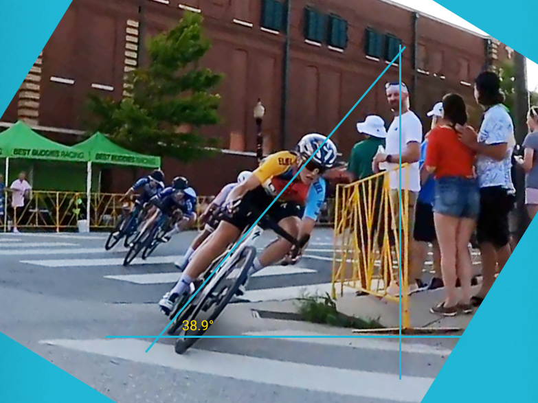 Skylar Schneider's crit lean. Bike racer leans 38.9 degrees into corner. Video still by Kendall Ryan.