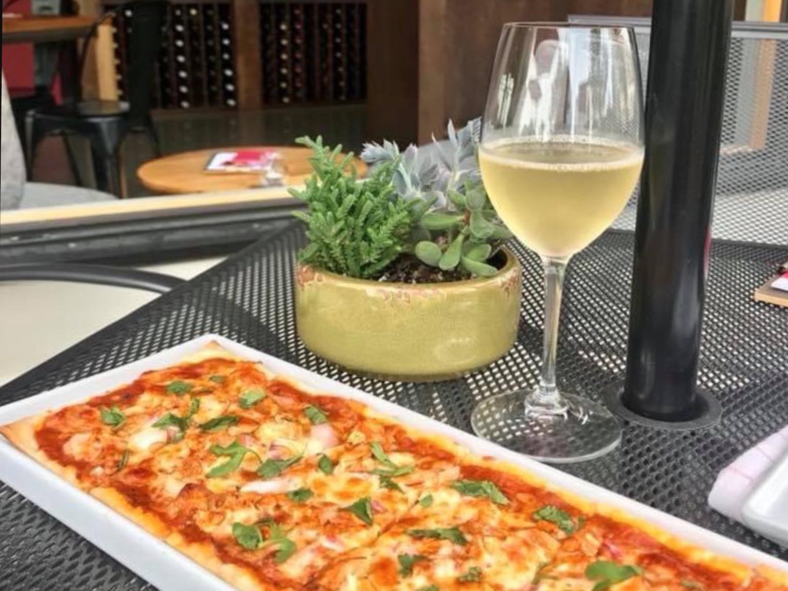 Flatbread and wine on patio at The Ruby Tap