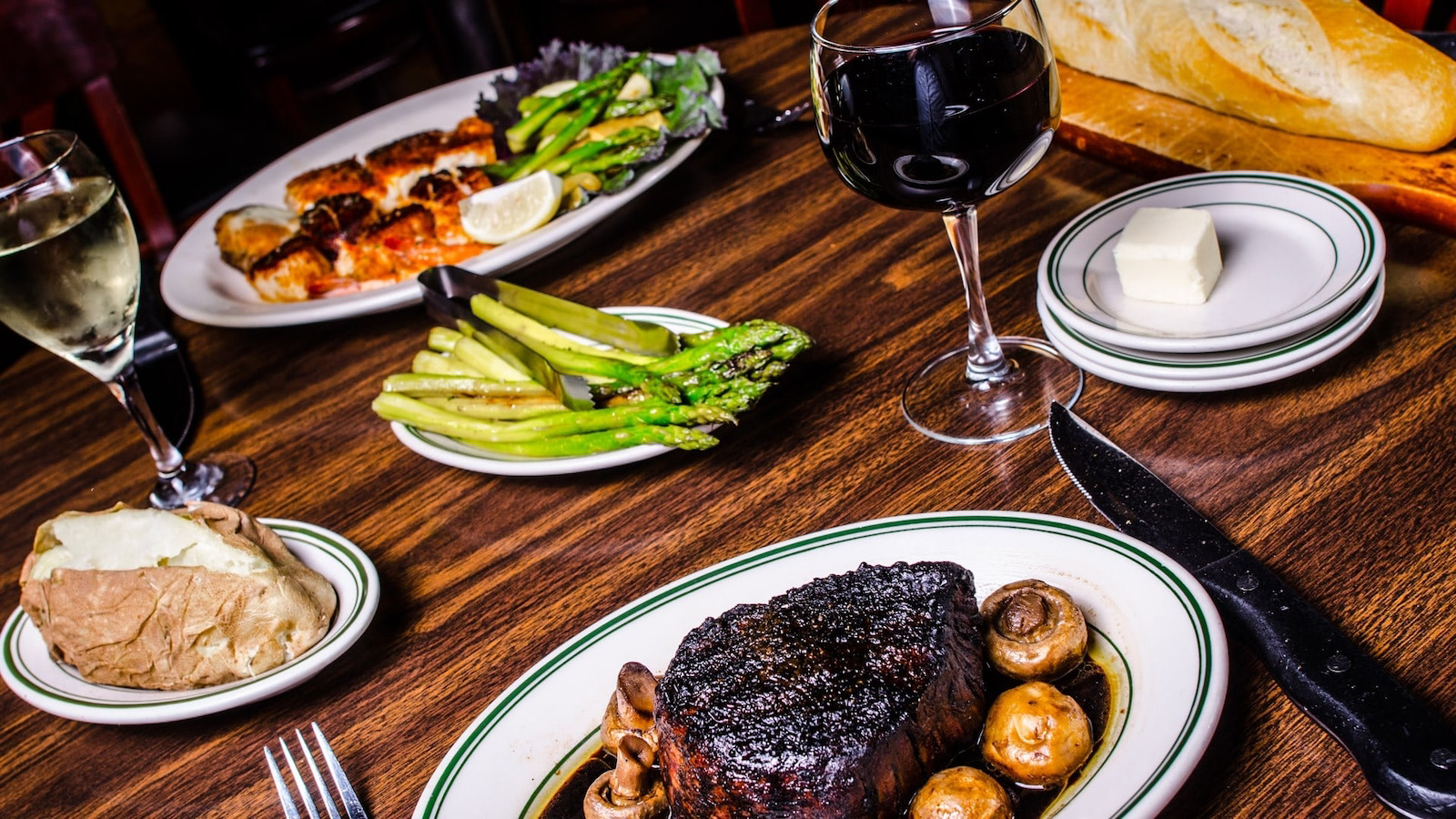 Five O'Clock Steakhouse table of food