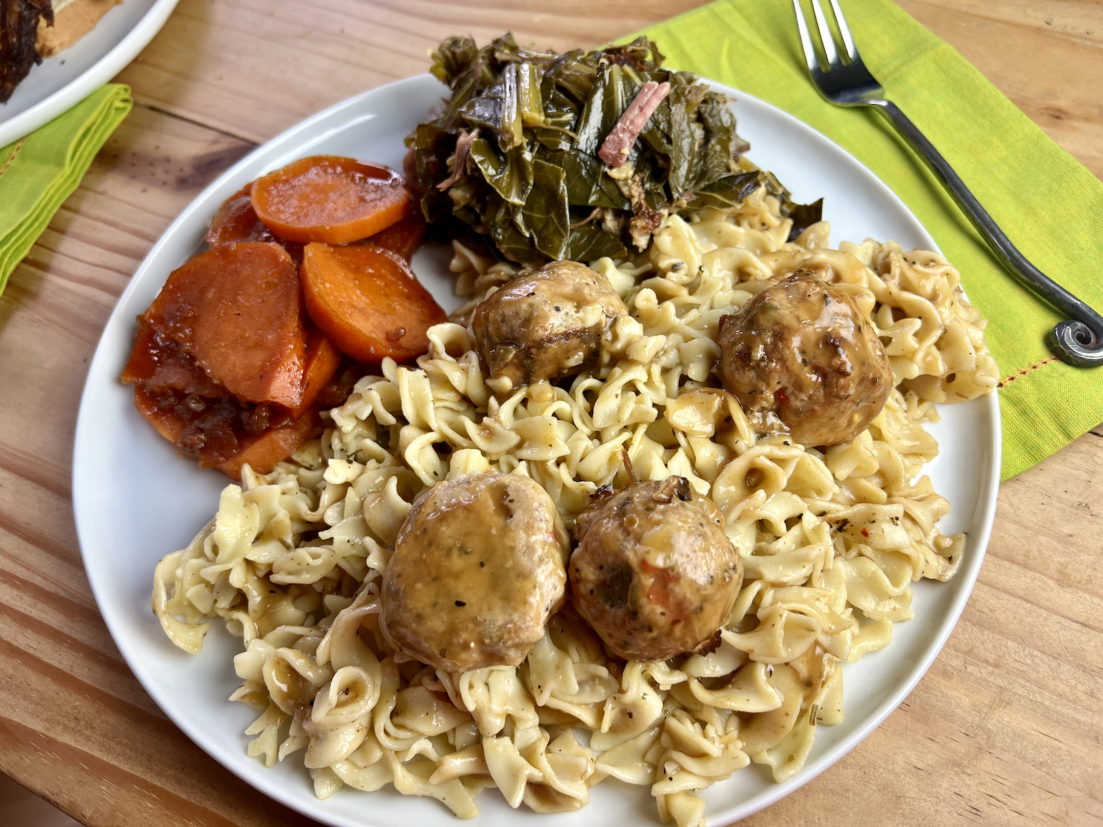 Savory meatballs over pasta