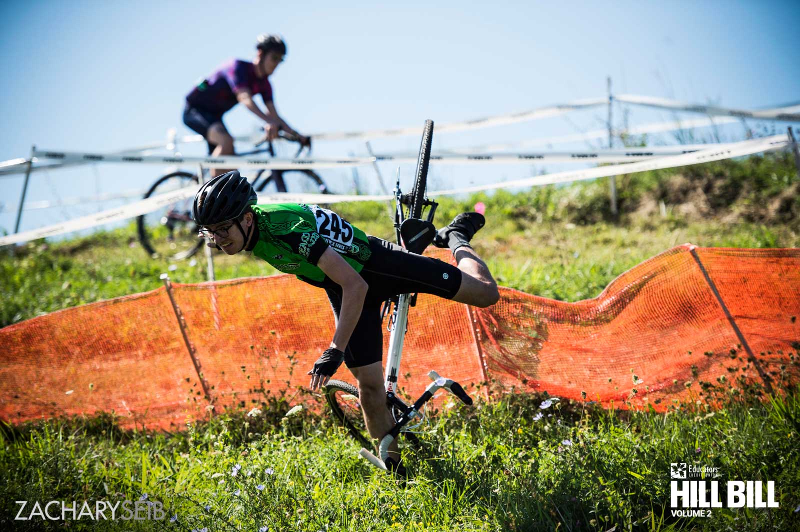 A cyclocross racer with limbs akimbo going over the bars on a descent.