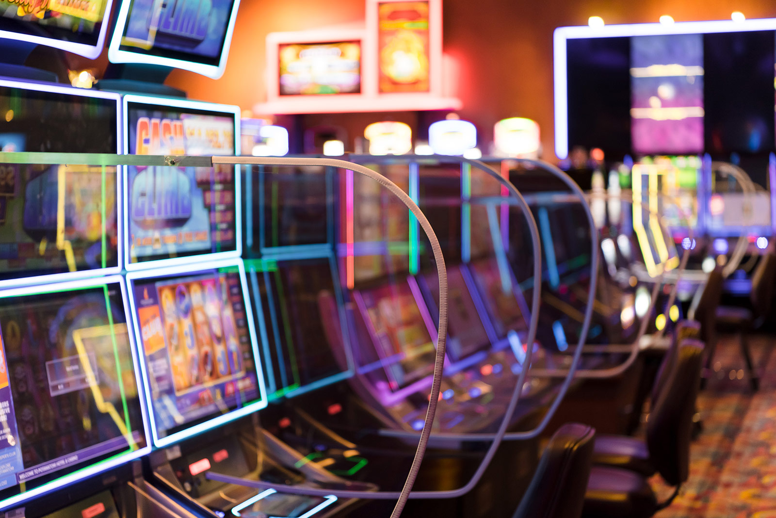 Slot machines separated by plexiglass barriers at Potawatomi Hotel & Casino