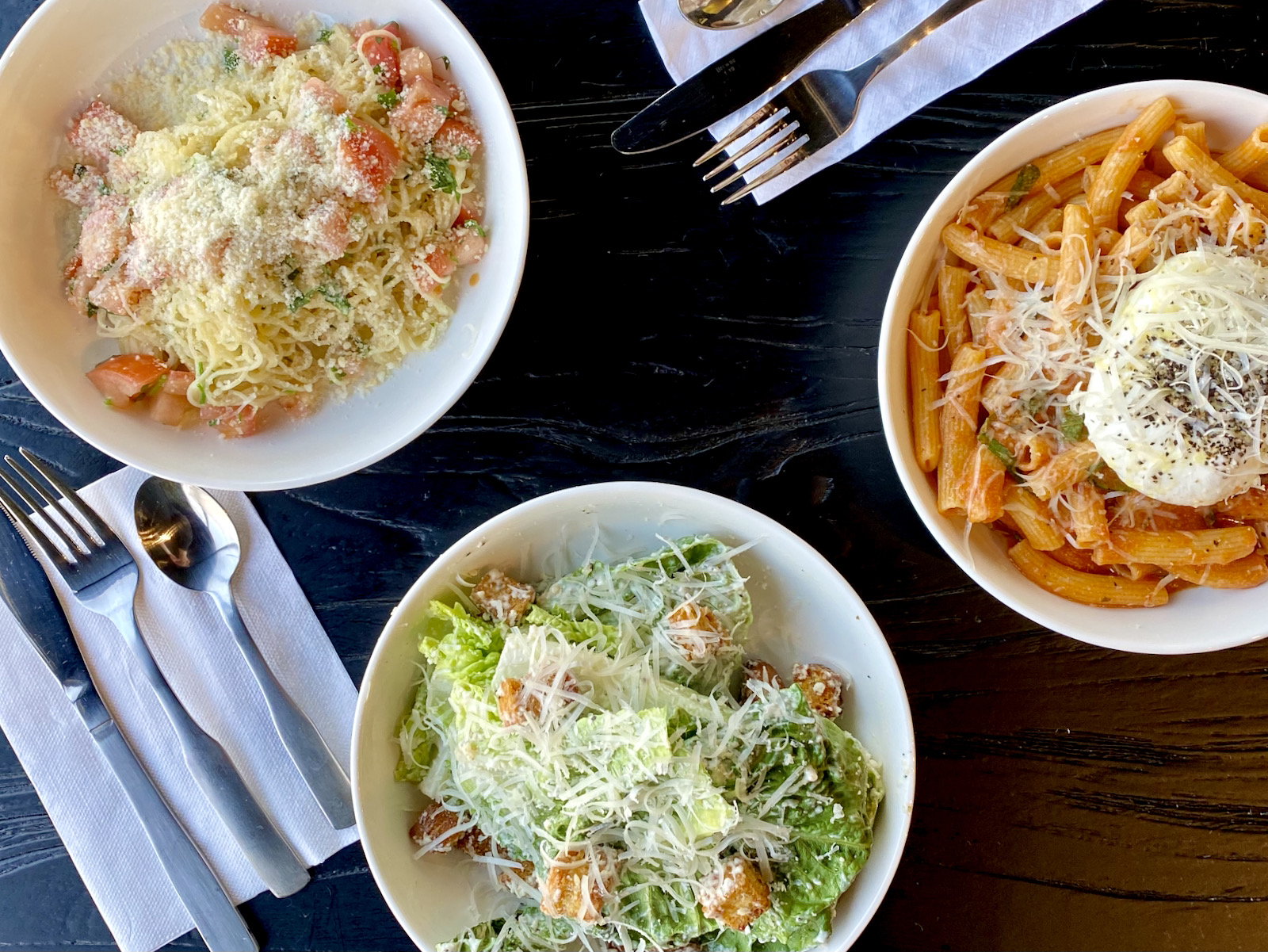 Pasta and salad in bowls