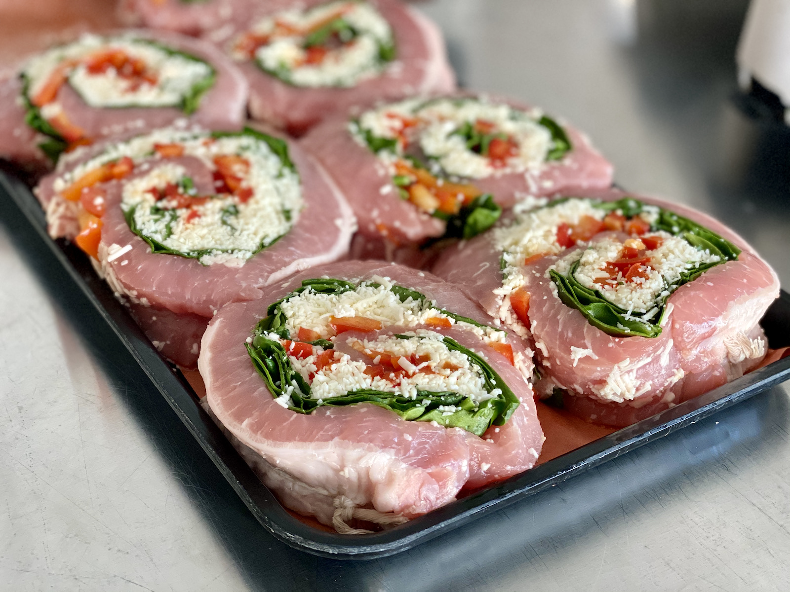 Stuffed pork roast medallions