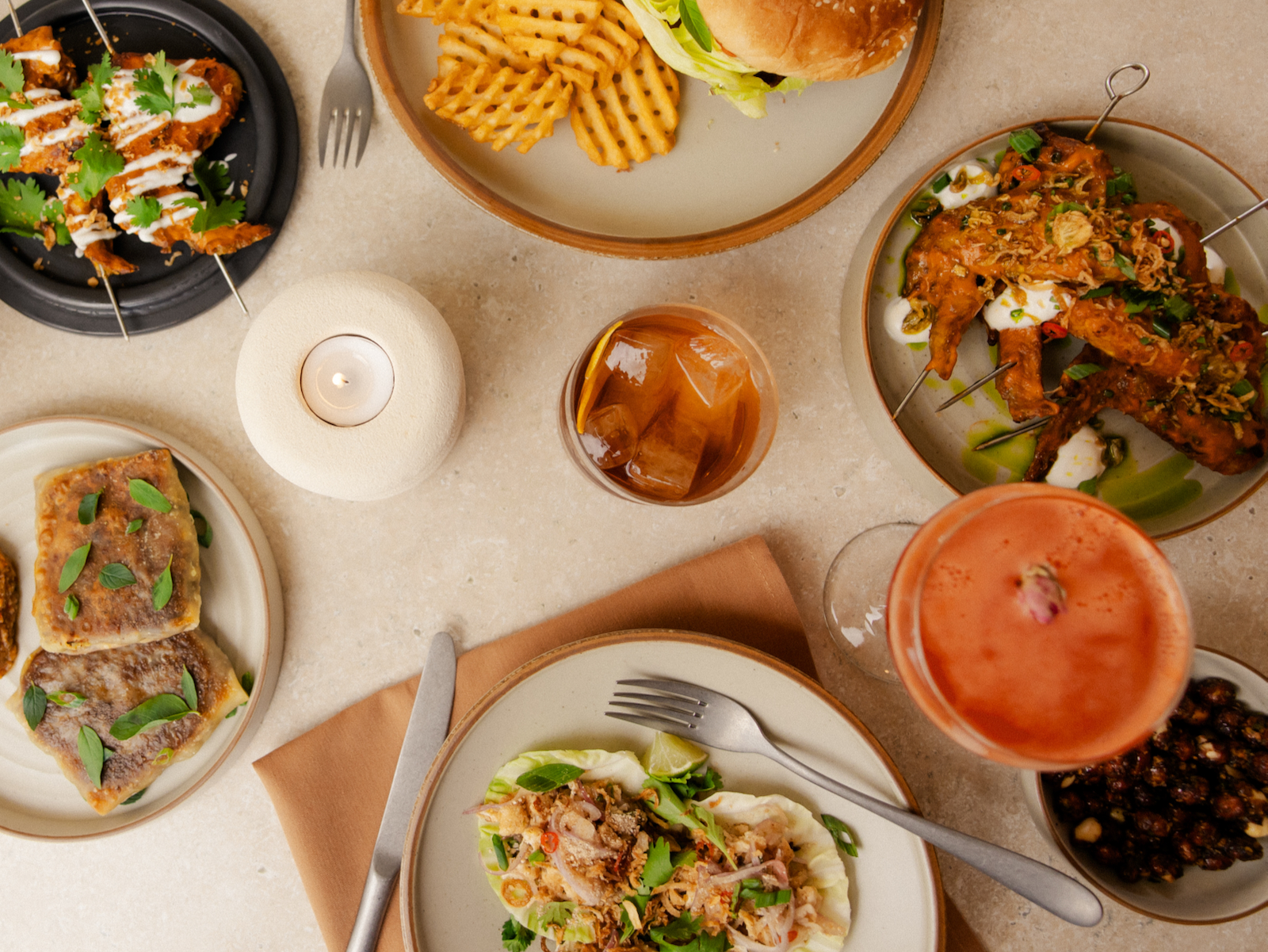 A spread of dishes at The Wolf (Photo: Mann Frau)