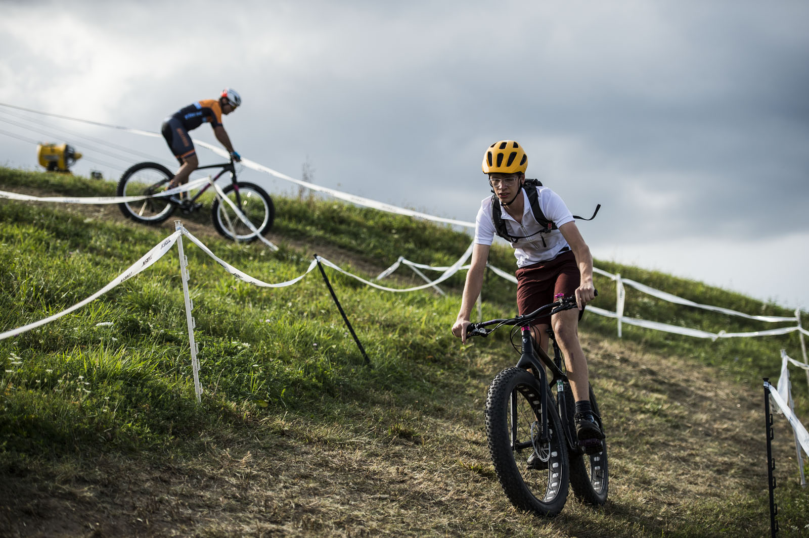 A young man rides his fat bike down a switchback. Photo © Zachary Seib Photography.