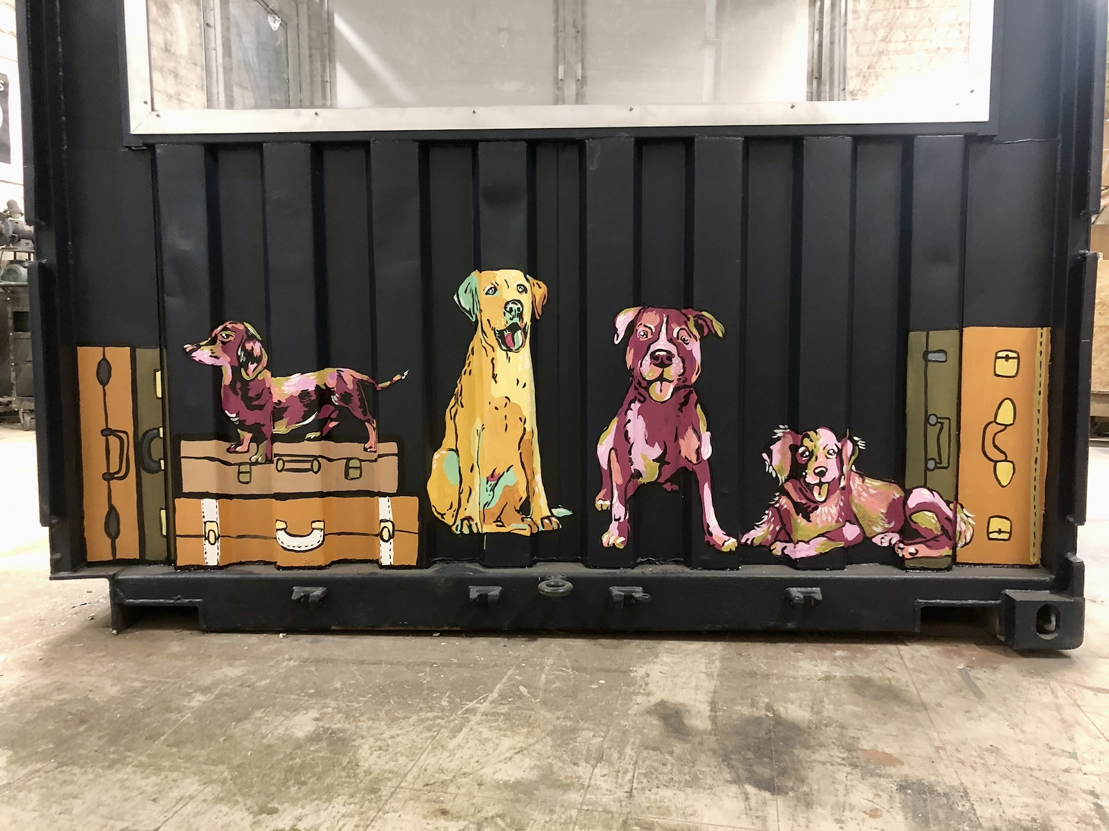 Dogs, luggage and beer painted on dining car