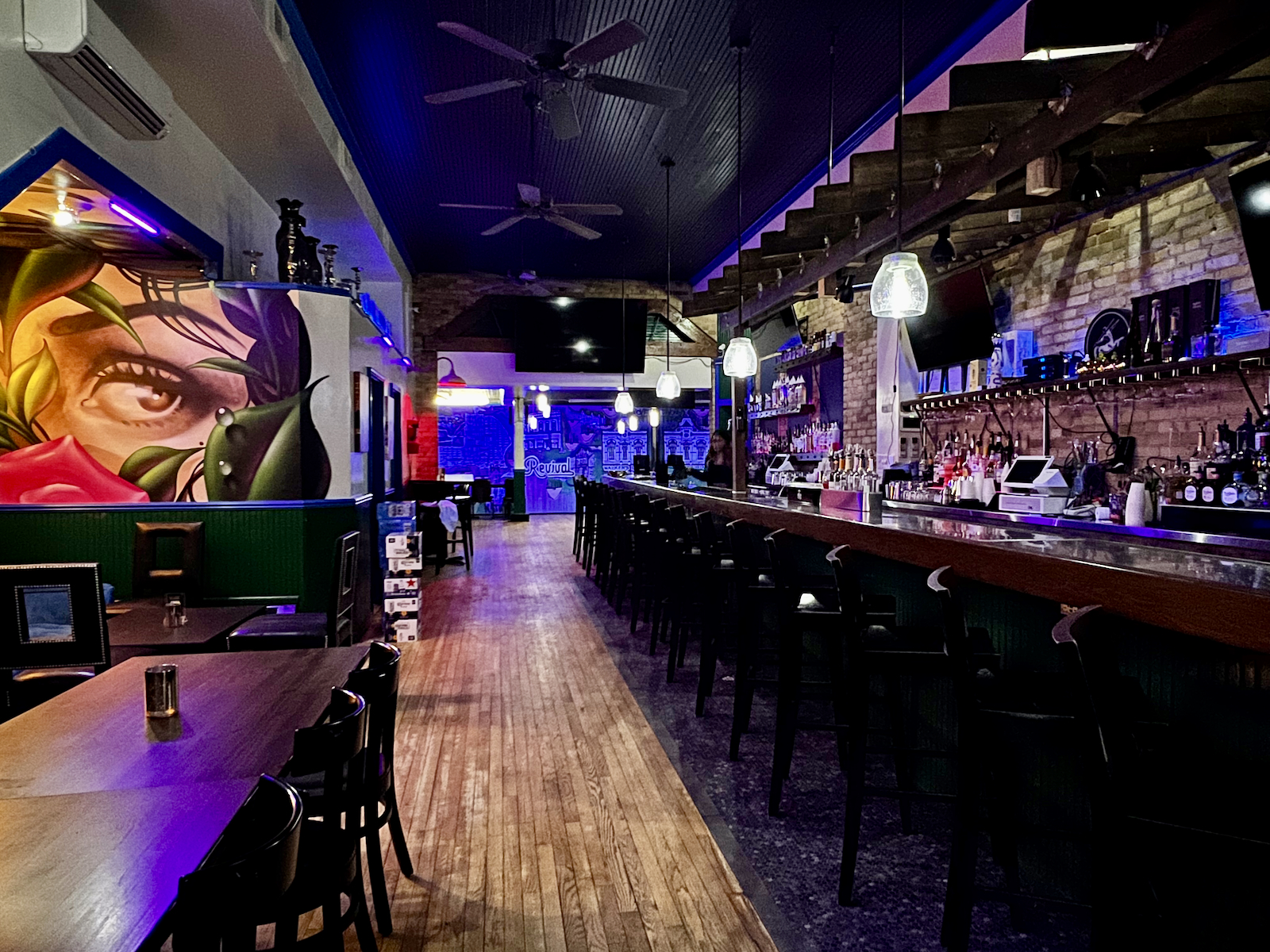 A view of the bar back to dining room at Revival