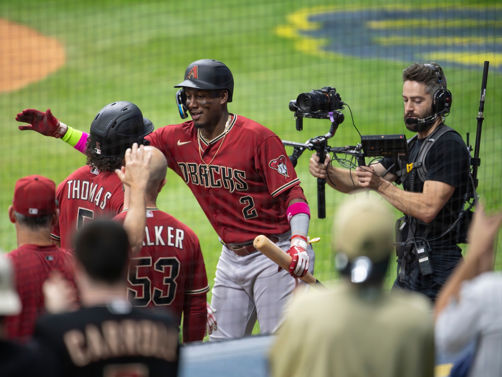 Arizona Diamondbacks' Craig Counsell celebrates with his teammates