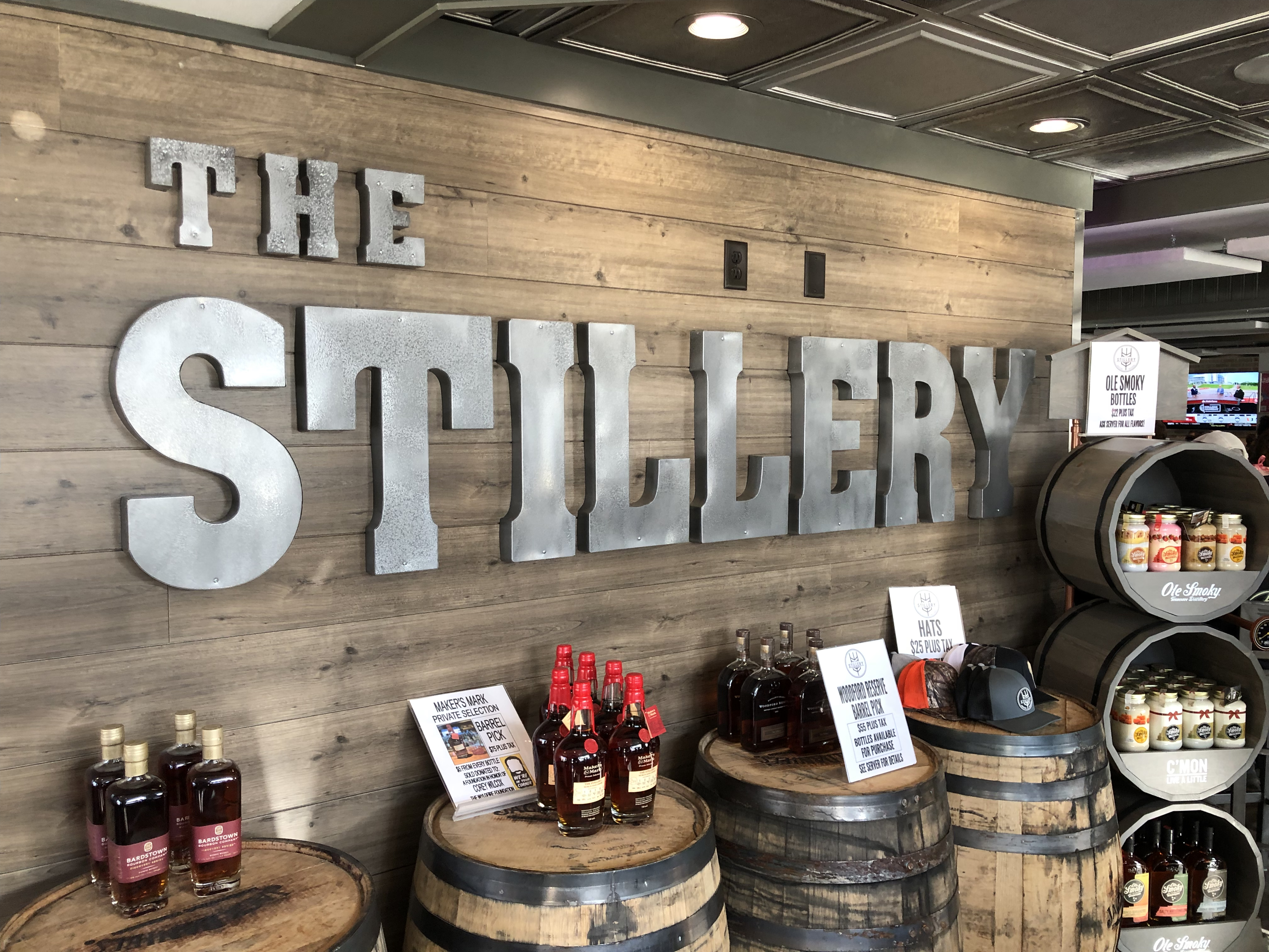 The Stillery sign and whiskey barrels