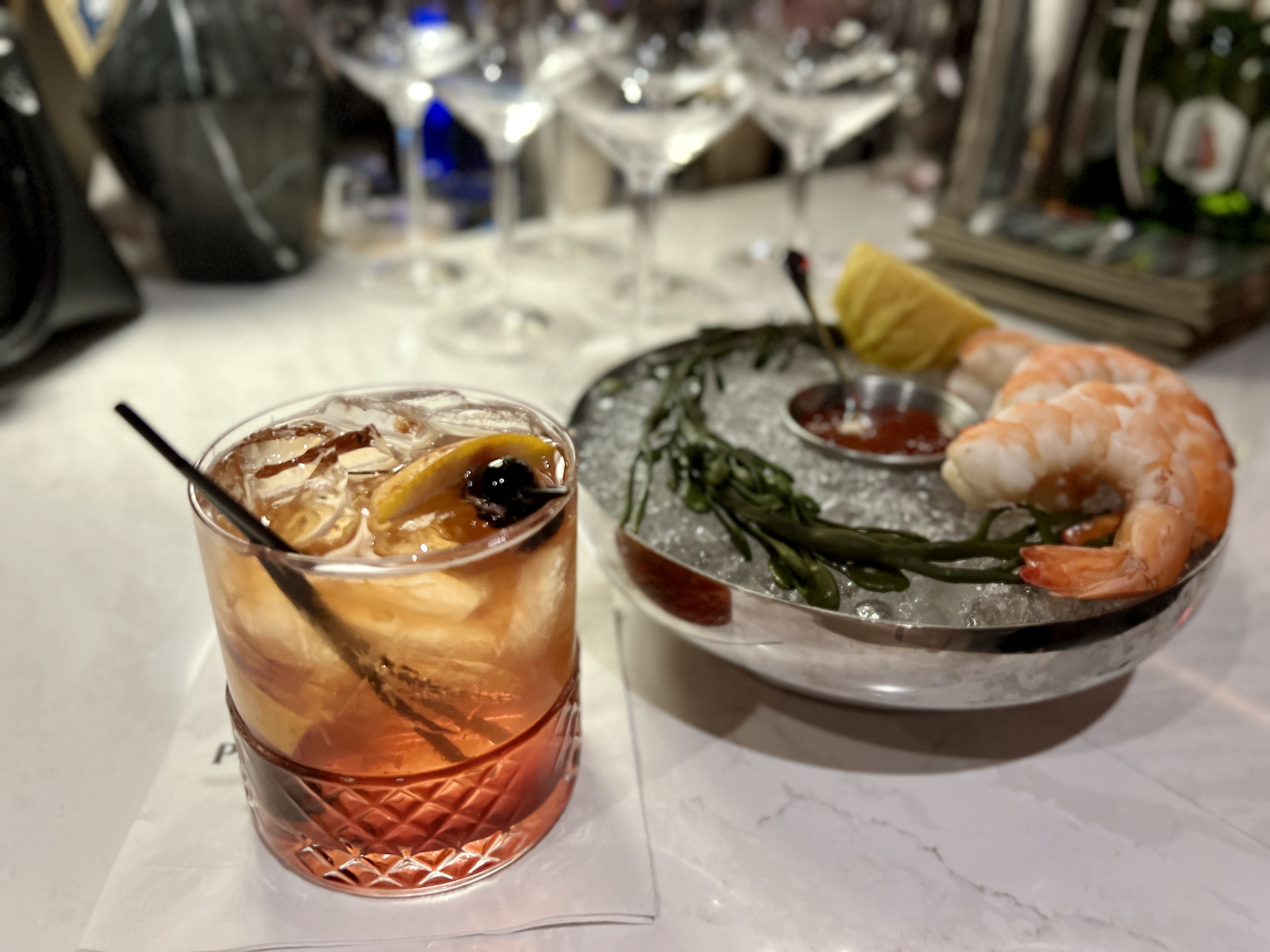 Shrimp cocktail and Old Fashioned at Dream Dance Steakhouse