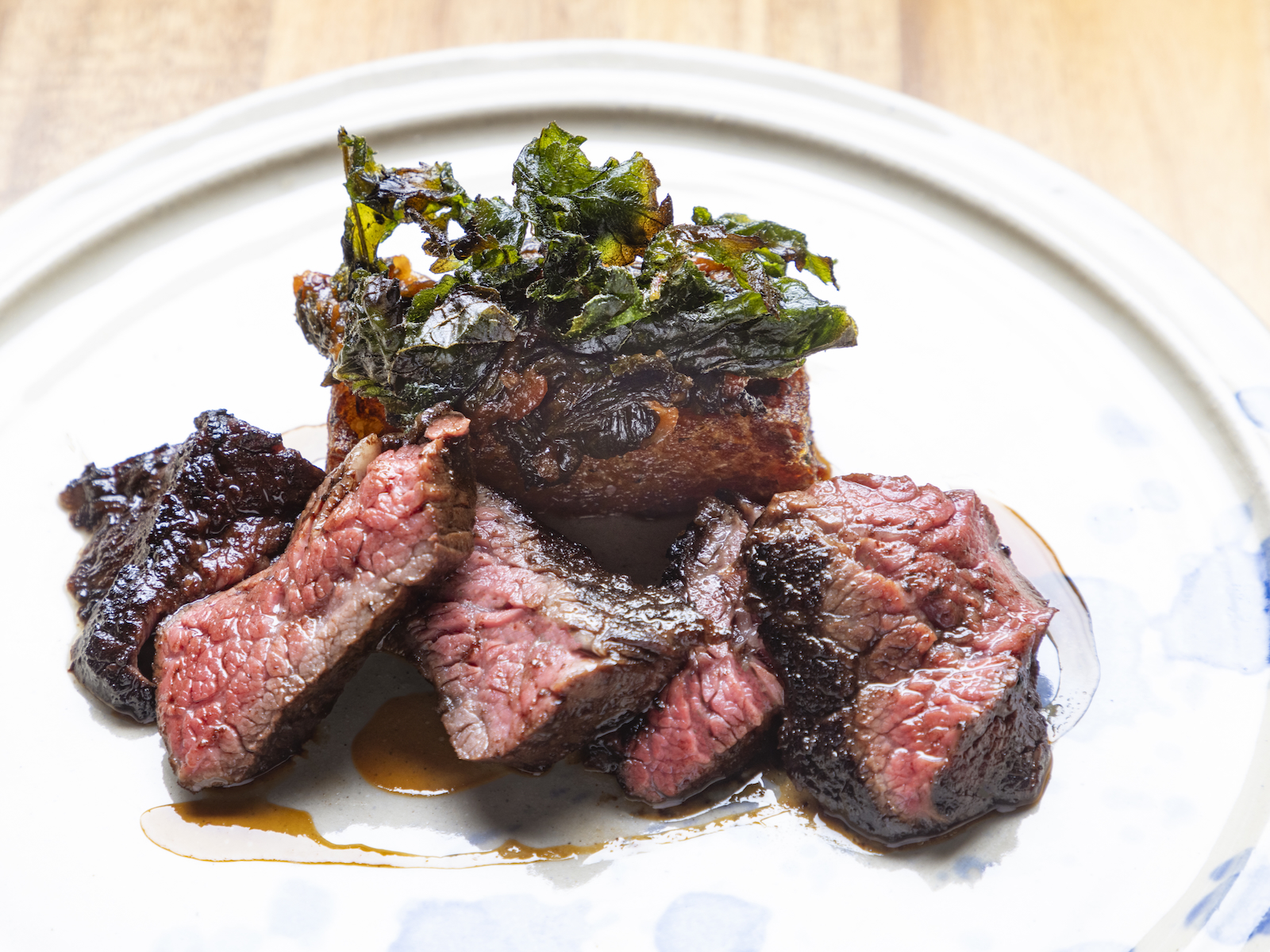 Coulotte steak, tomato, potato, mustard greens