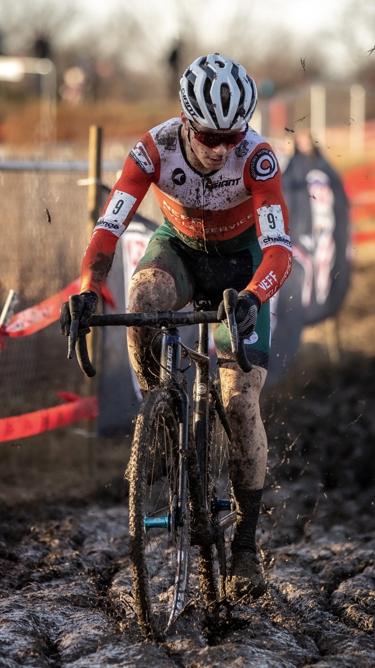 Caleb Swartz racing cyclocross through the mud.