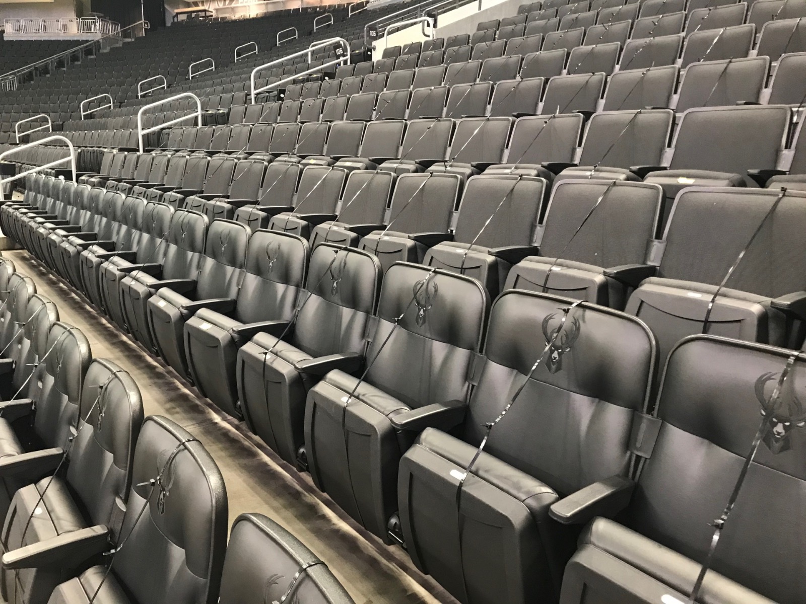 Seats at Fiserv Forum marked off.