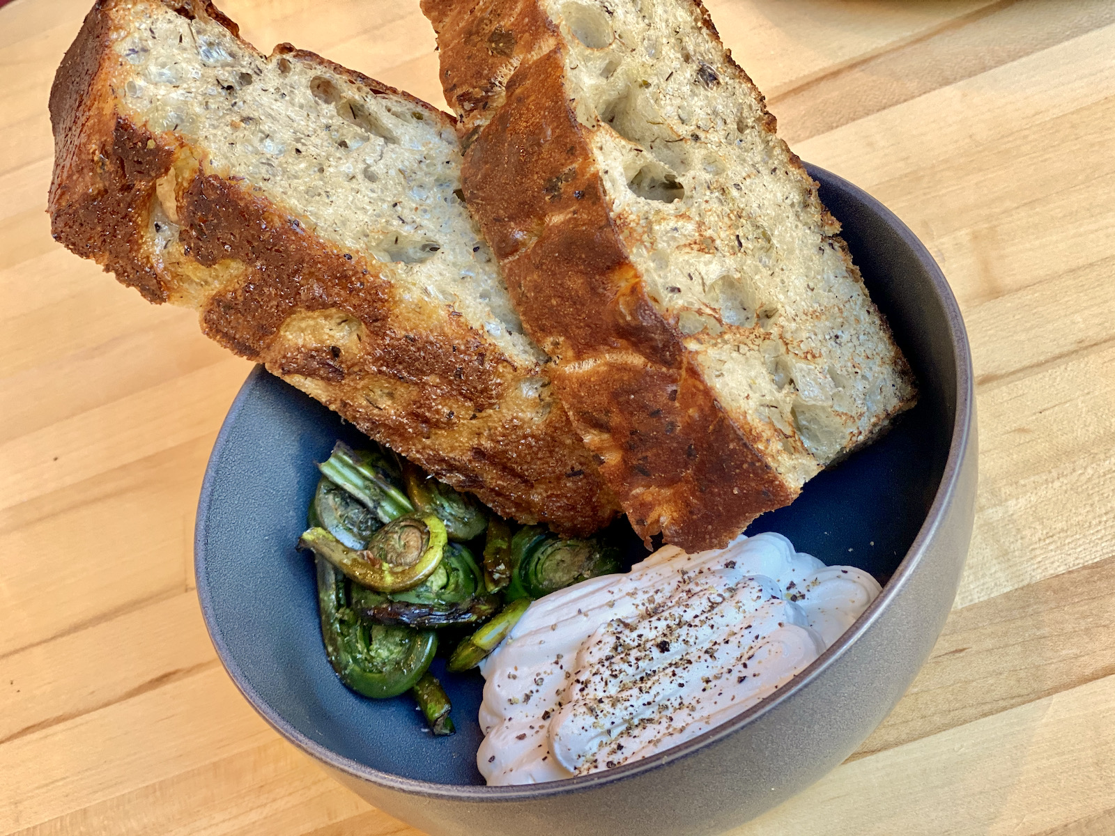 Birch focaccia, fiddleheads and ricotta