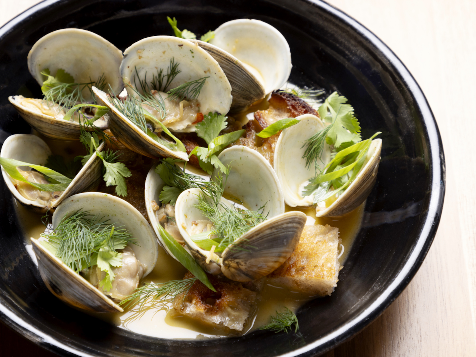 Clams with herbs, XO sauce, konbu, sourdough