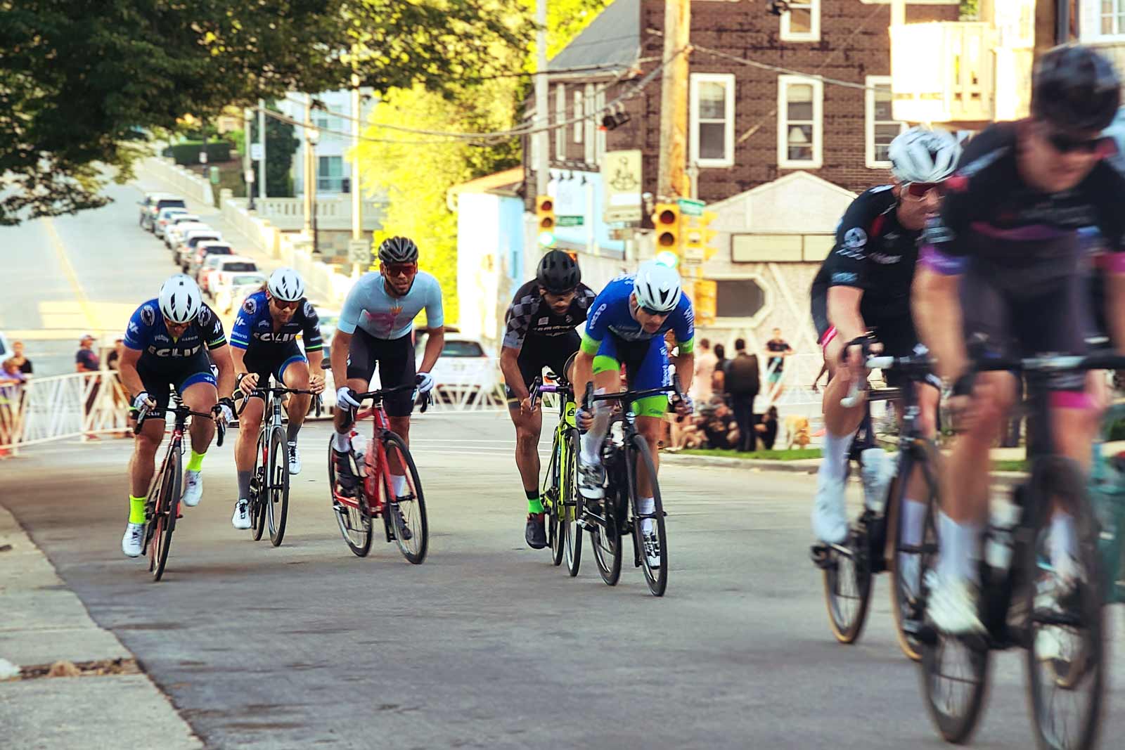 Bike racers climb up Humbolt Hill at the Great Brady Street Bike Race in 2022.