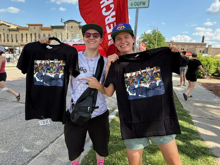 Two people with Tour of America's Dairyland tees
