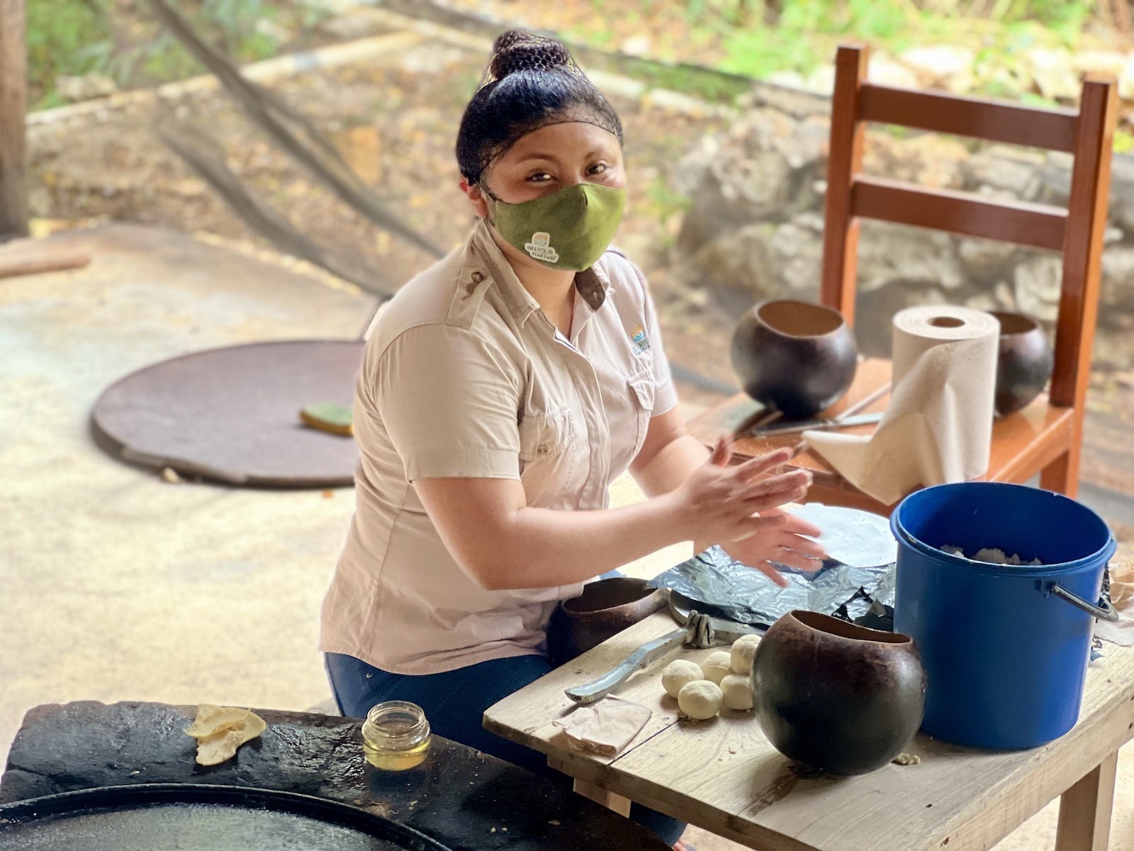 Mayan woman making tortillas