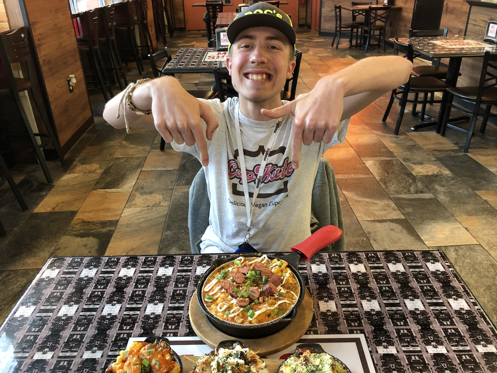 Dominic at the table with mac & cheese