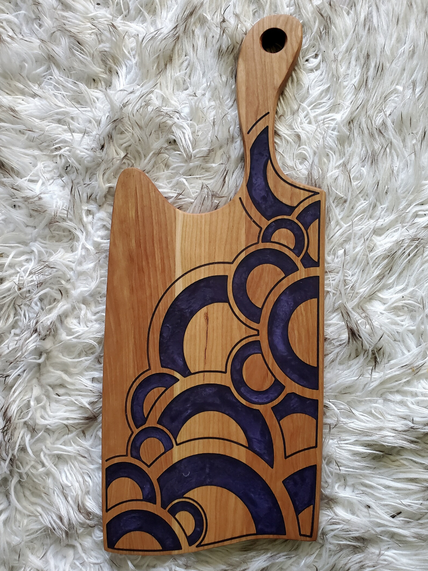 Cheese board with purple epoxy inlay