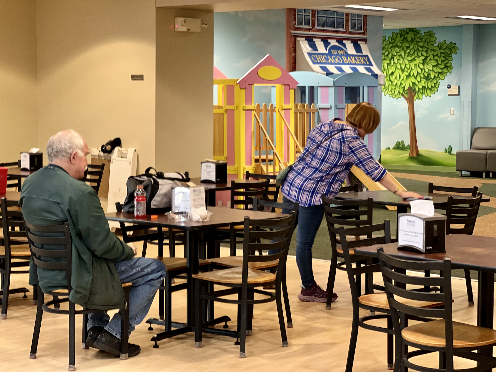 Cafe dining area and play area behind