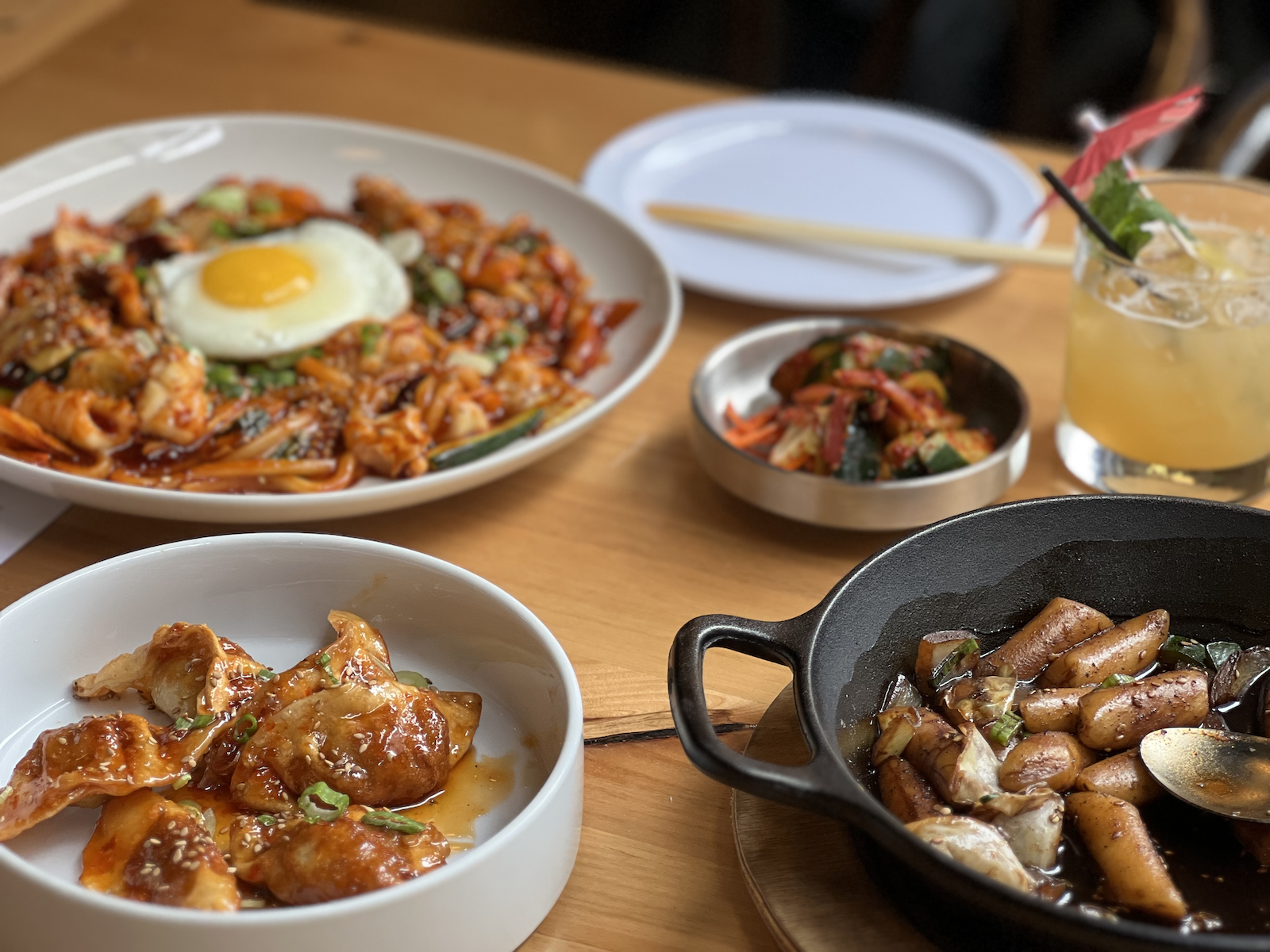 Udon stir fry, kimchi, dukbokki, dumplings at Sinabro