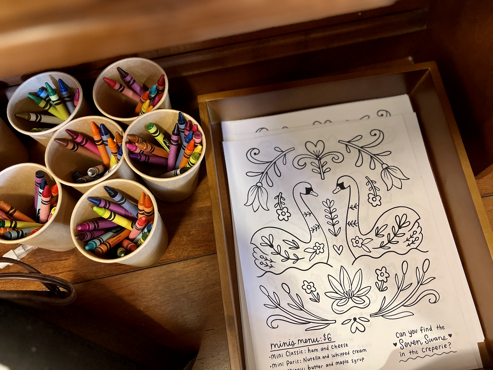 Kids coloring pages and crayons