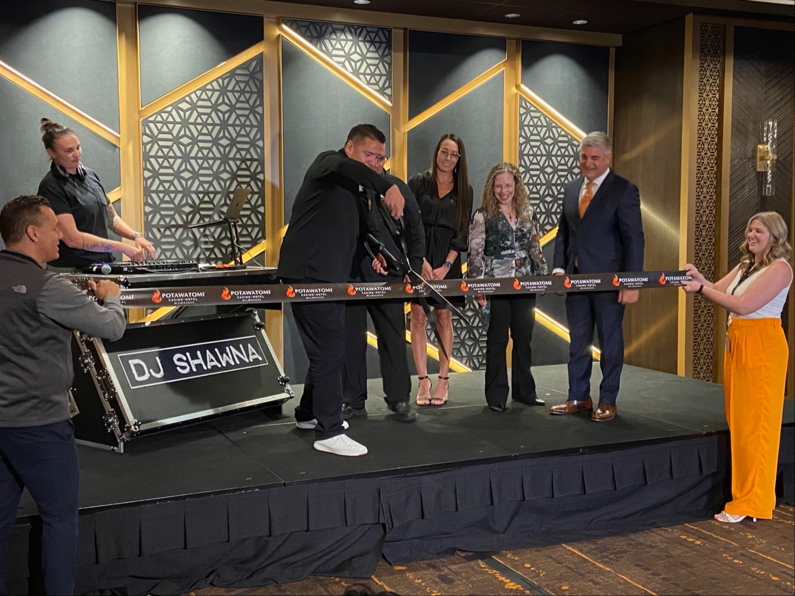 Potawatomi CEO Dominic Ortiz cuts the ribbon