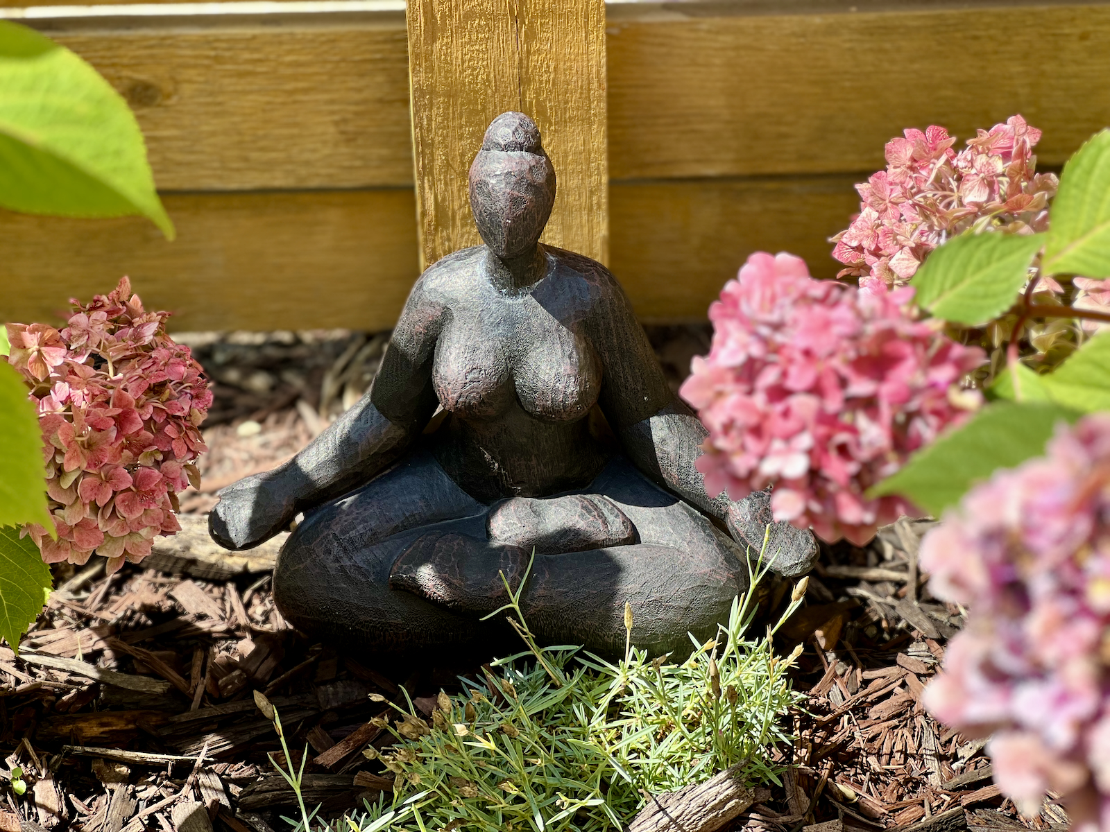 Buddha in patio garden at Sushi Yuki