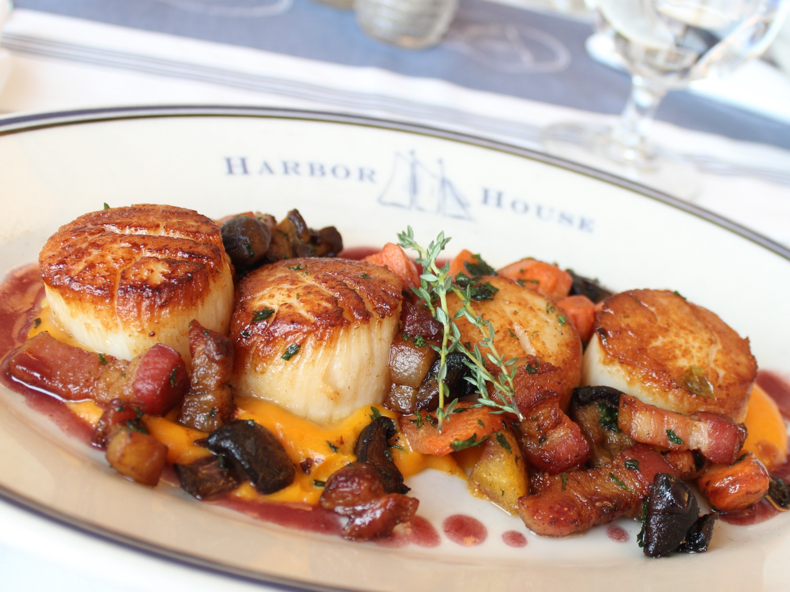 Seasonal scallop dish at Harbor House