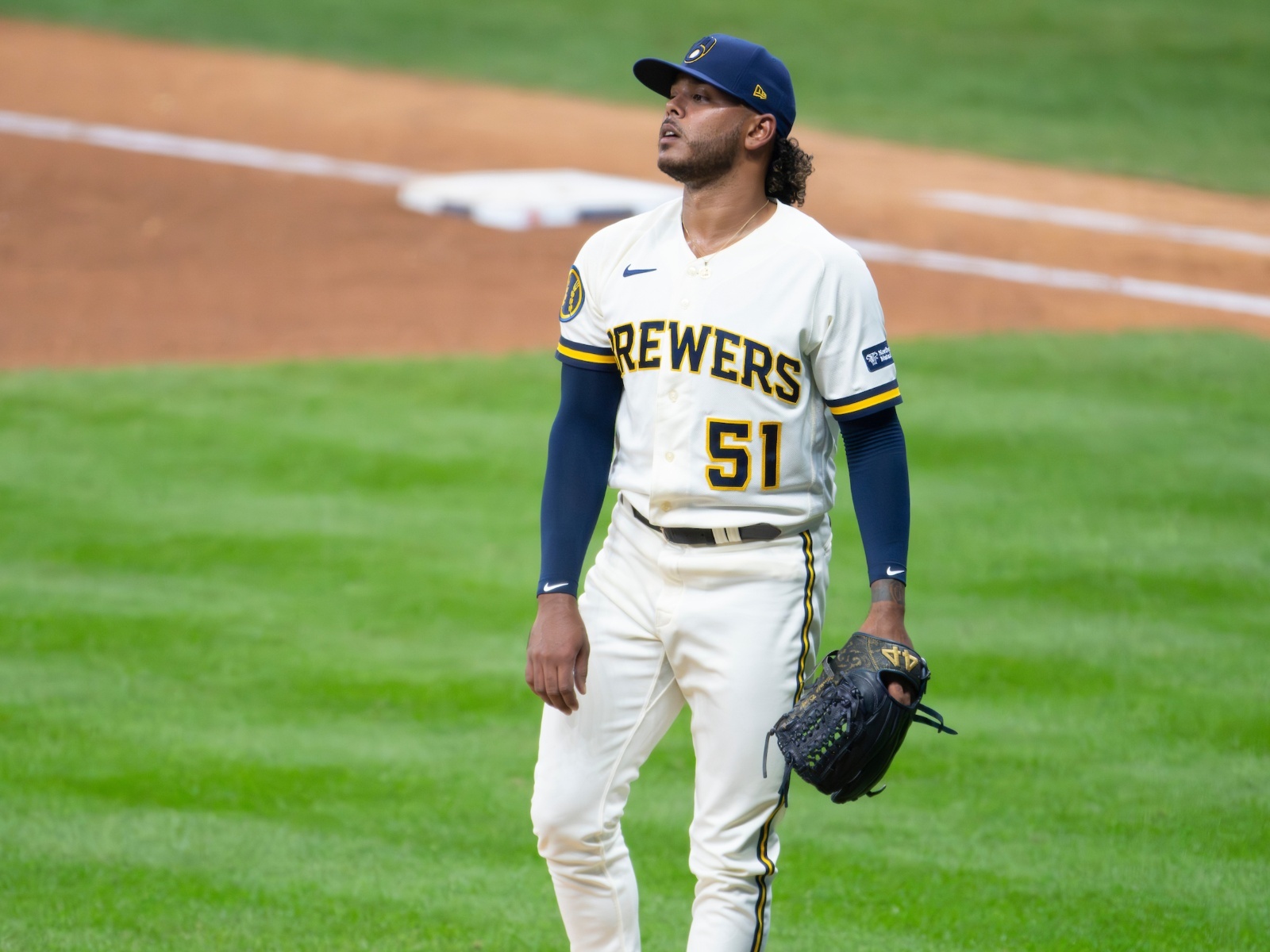 Arizona Diamondbacks' Craig Counsell celebrates with his teammates