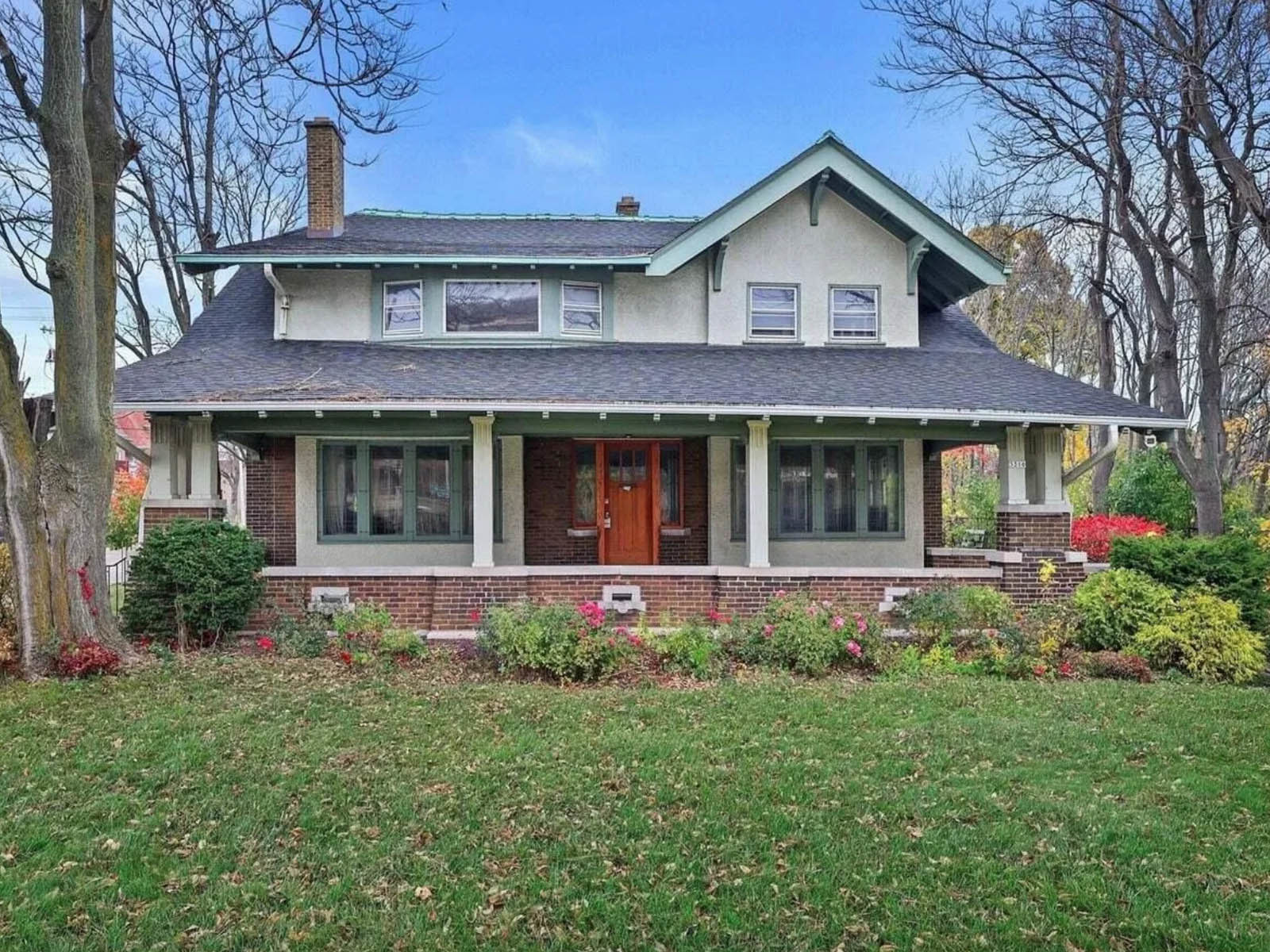 1914 Craftsman-style house, with incredible windows &amp; huge library 