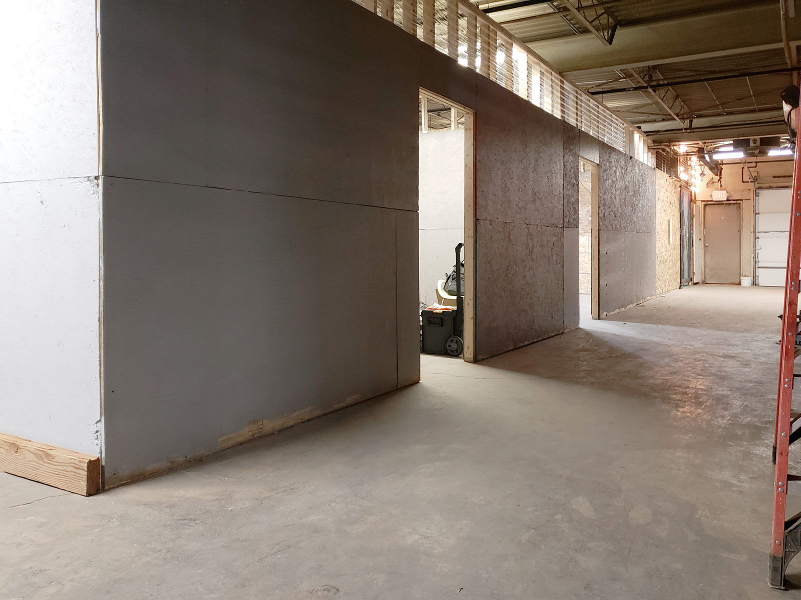 Three loading-dock studios, drywalled and nearing completion