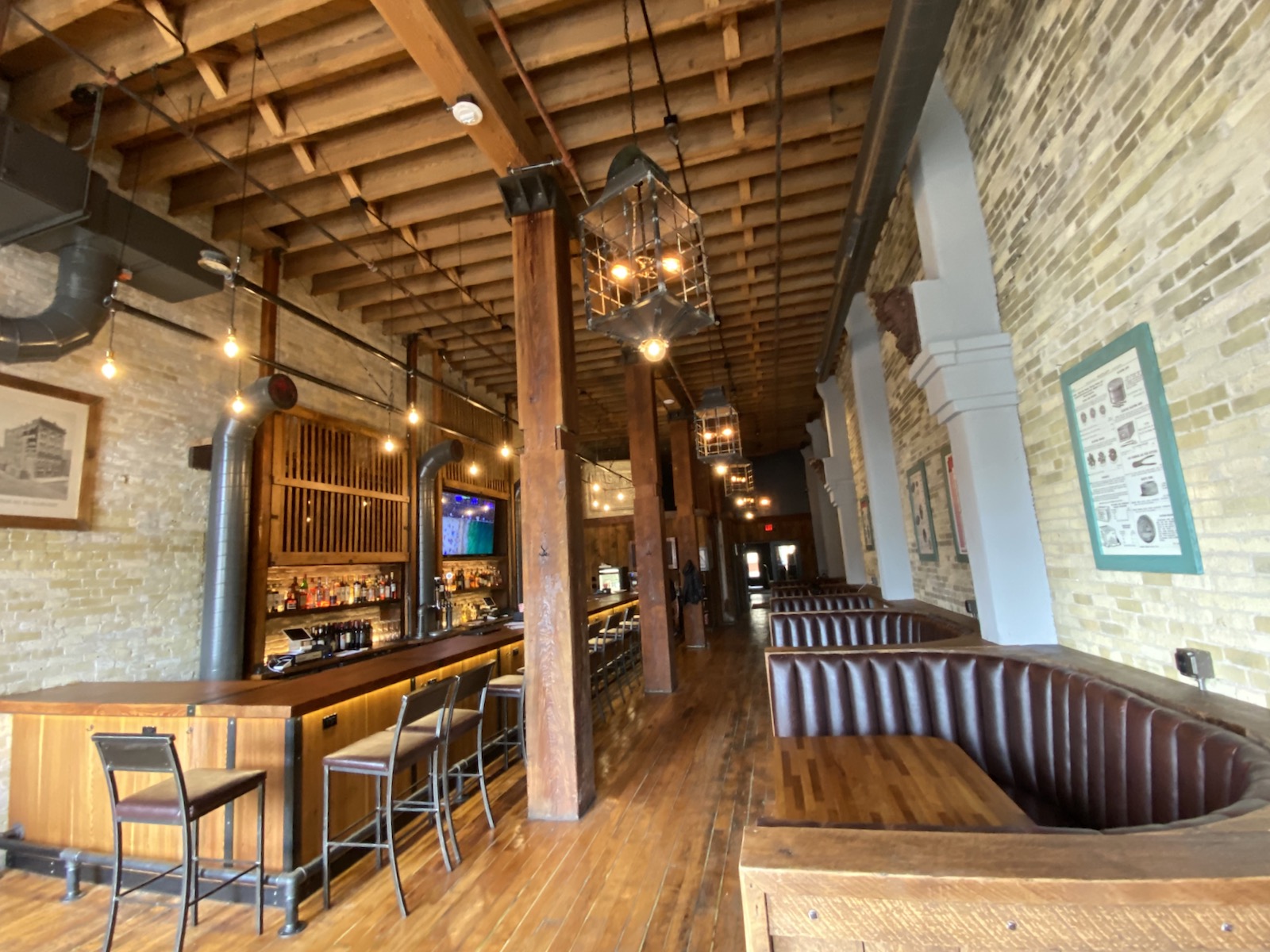 A wide shot of bar and seating at Aperitivo