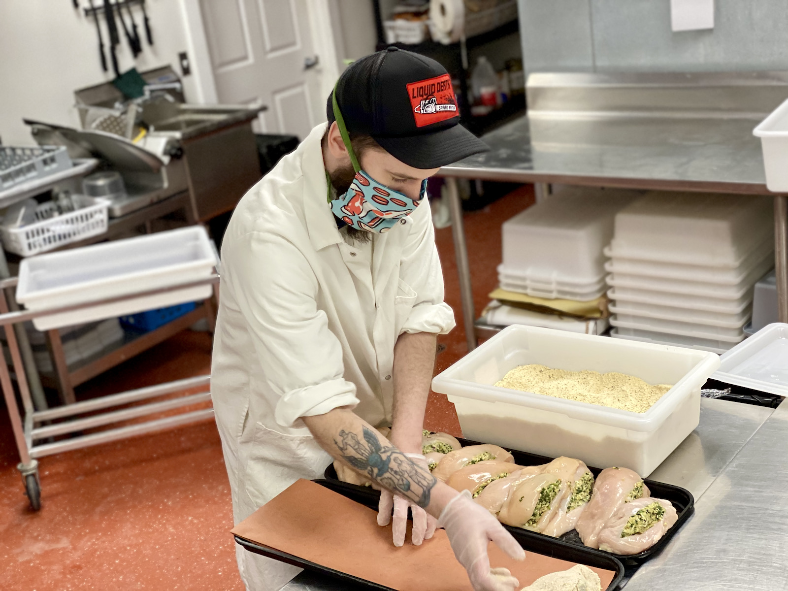 Michael Donnell breading stuffed chicken breasts