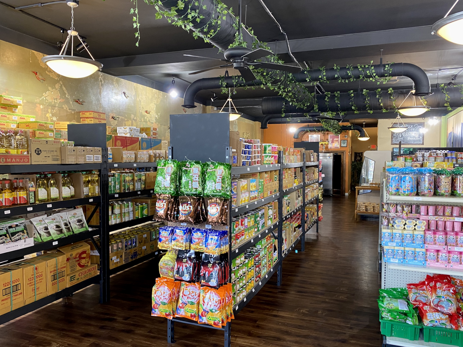 Shelves full of product in Mekong Cafe's grocery store