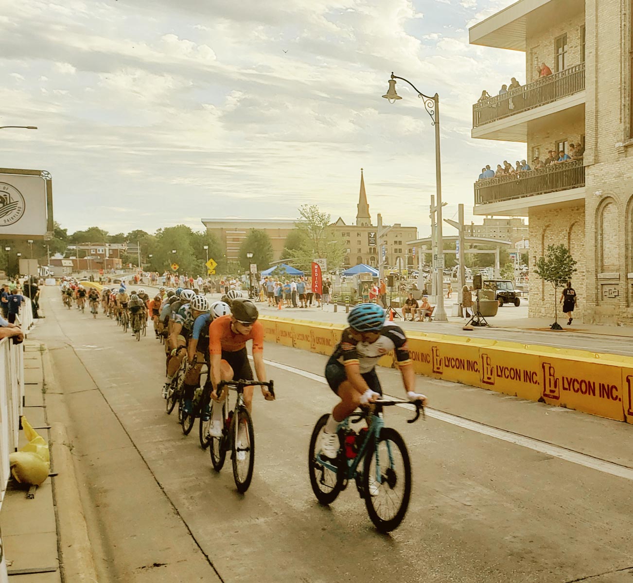 A lead bike racer looks back at the chasing peloton in Janesville. Photo by Jason McDowell.