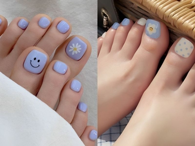 Những mẫu nail xanh dương nhạt có vẽ hoạ tiết mặt cười, hoa cho chân