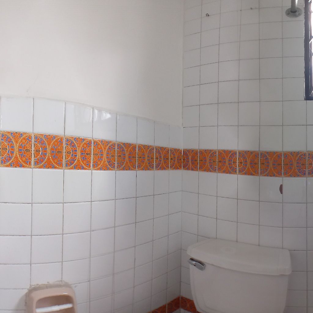 Baño de servicio