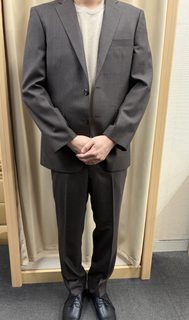 表地に負けない、ボタンと裏地の存在感。の画像