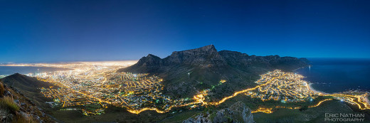 Night-time, moonlit panoramic of the city of Cape Town and Table Mountain.