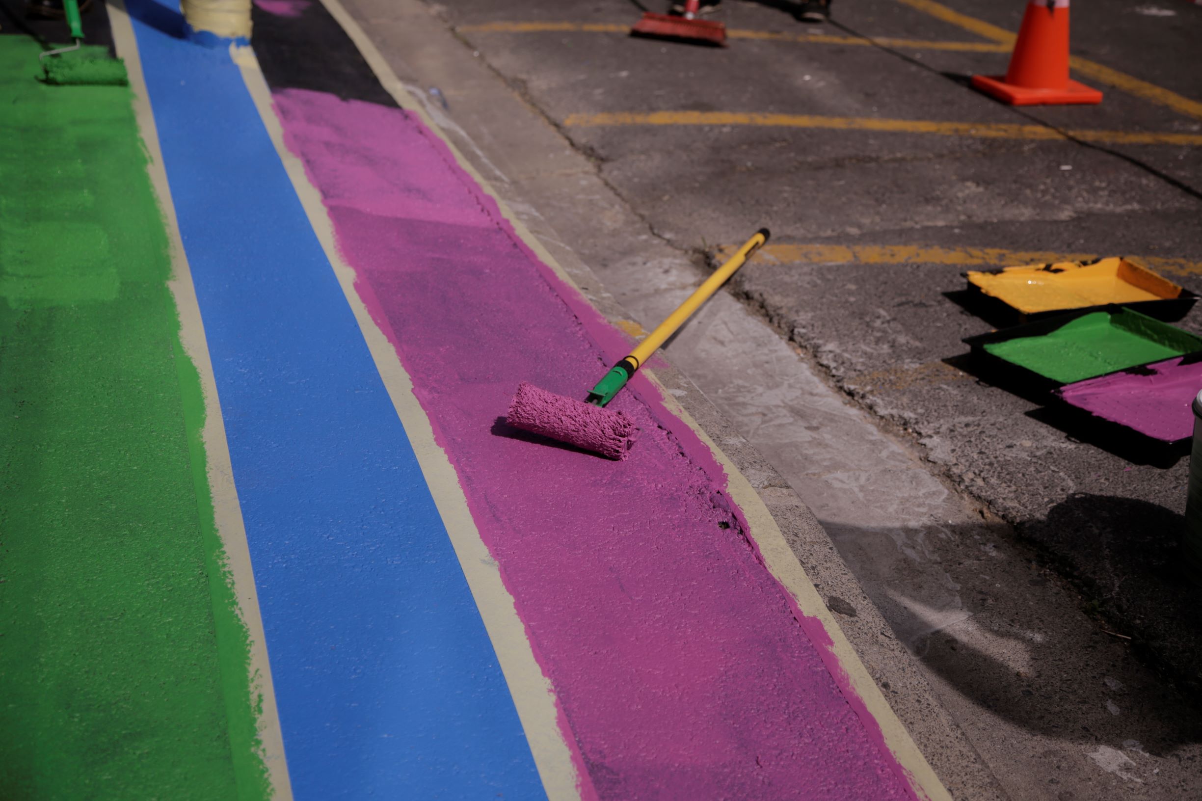 the raptor room pridewalk painting purple roller
