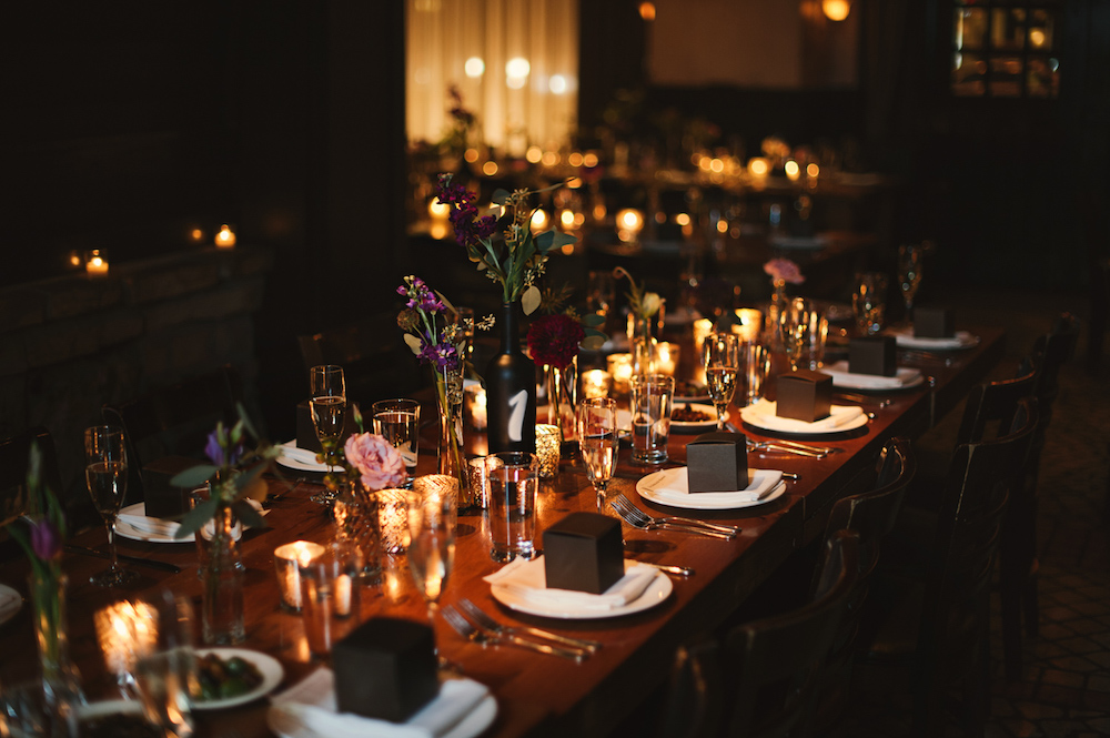 The dining room tables are set for wedding at Osteria via Stato.