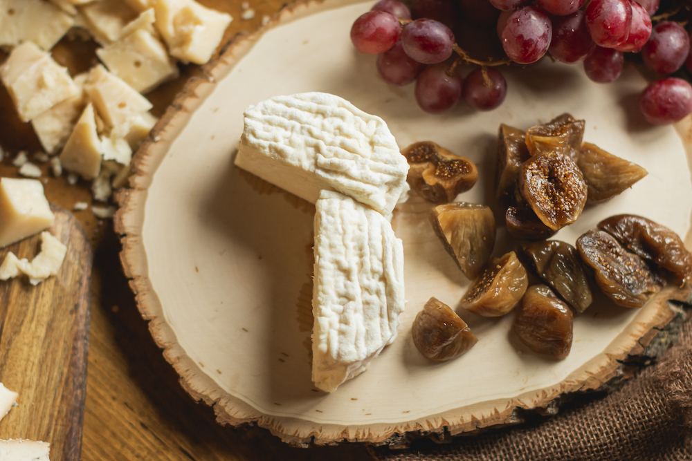 An artisan cheese and charcuterie board at Osteria Via Stato.