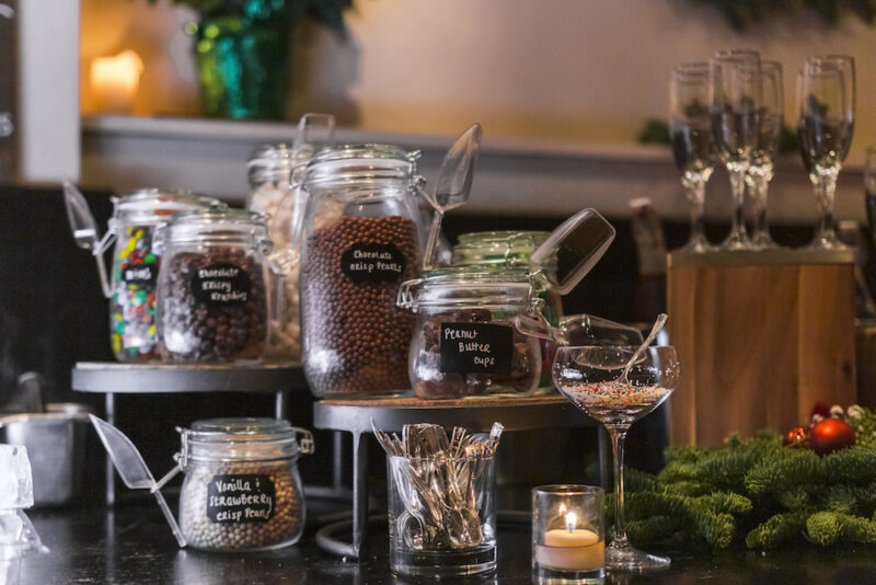 Apothocary jars of candies and toppings for gelato bar