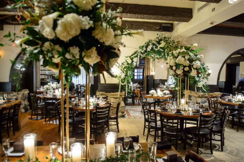 The tables are set for wedding dinner at Osteria via Stato.